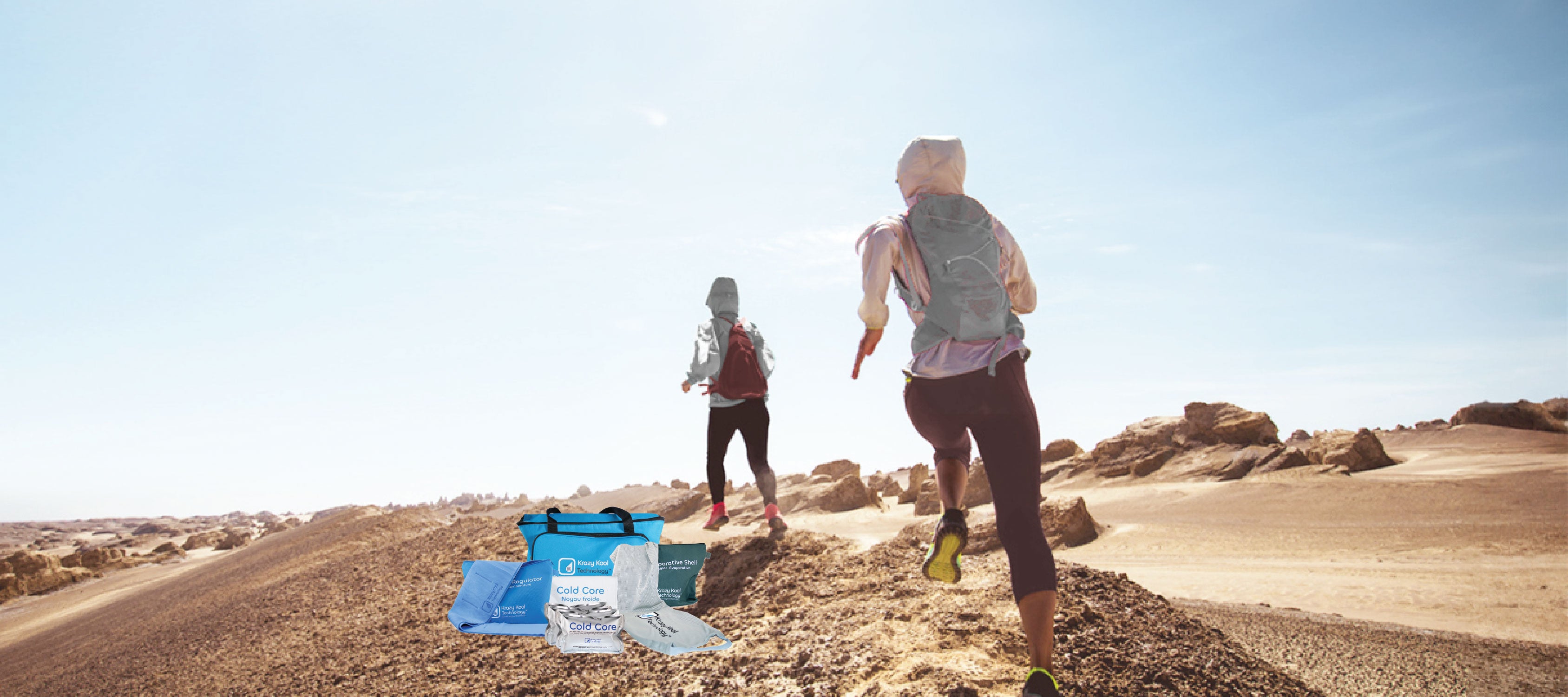 The back of two extreme female athletic runners in the desert, highlighting the Krazy Kool Technology cold therapy system that helps mitigate and cool the body in extreme temperatures.