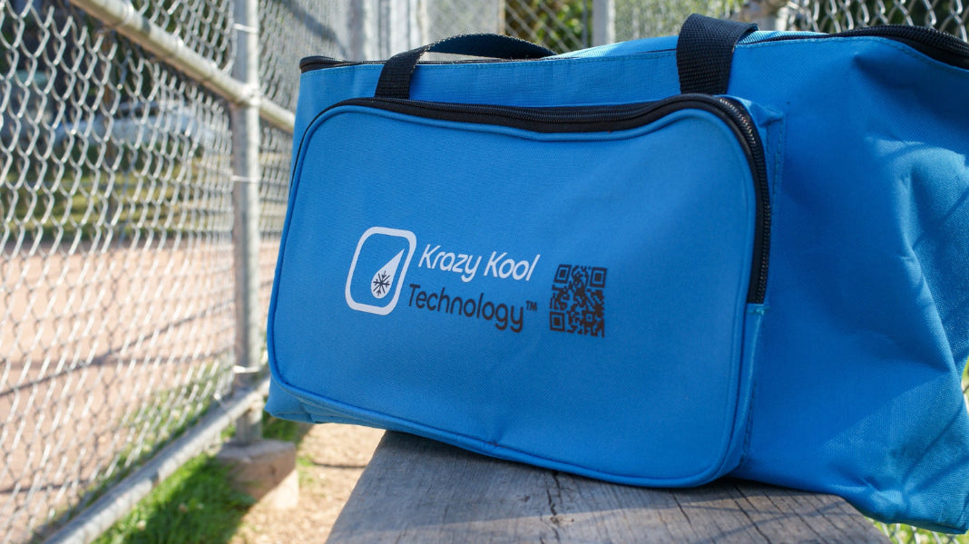 Blue bag with Krazy Kool Technology logo on an outdoor wooden bench